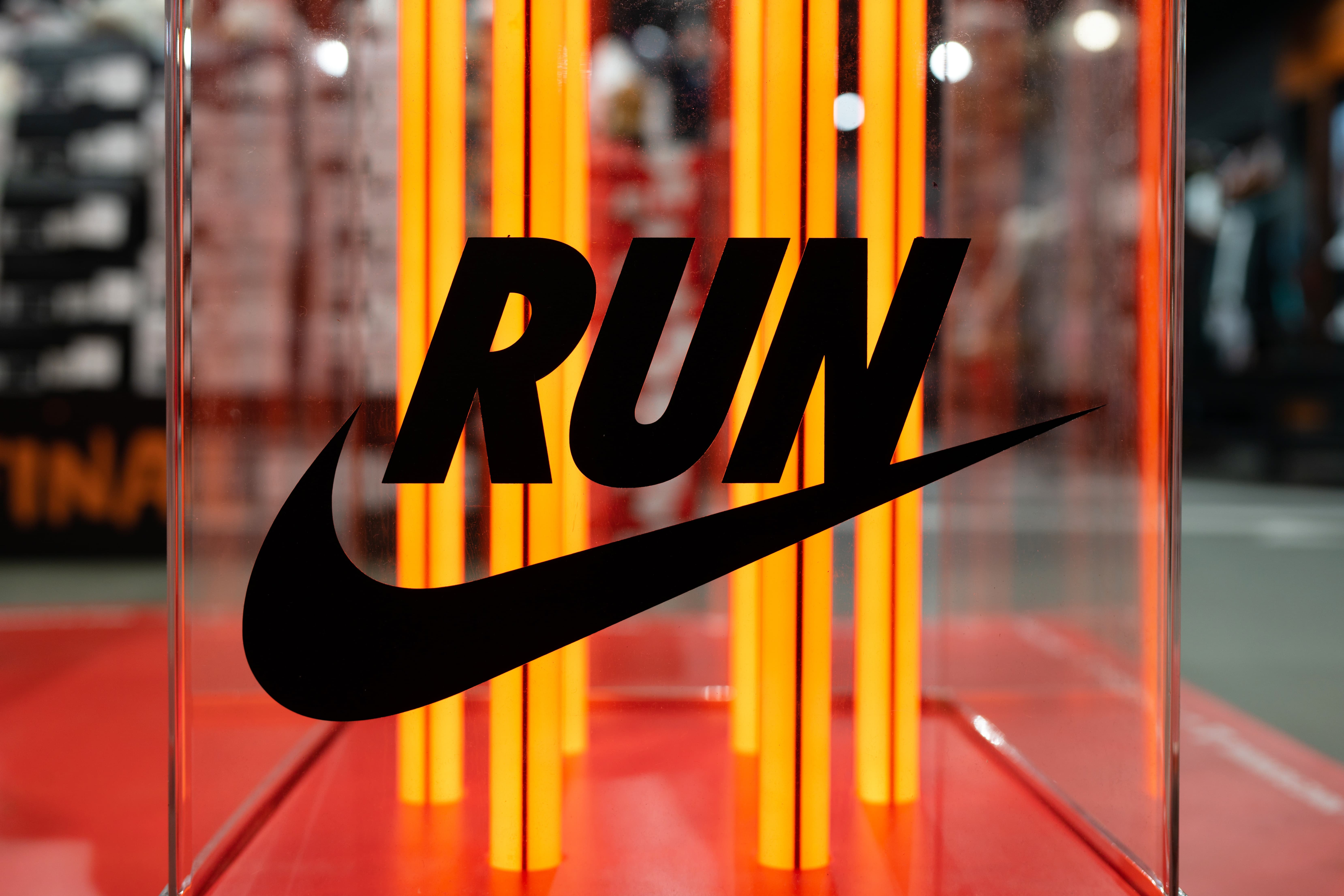Close up of words 'RUN' on Nike storefront