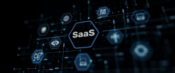 Keyboard signs and other imagery showcasing digital infrastructure in light blue tiles on a dark blue background, centred on one sayingSaaS