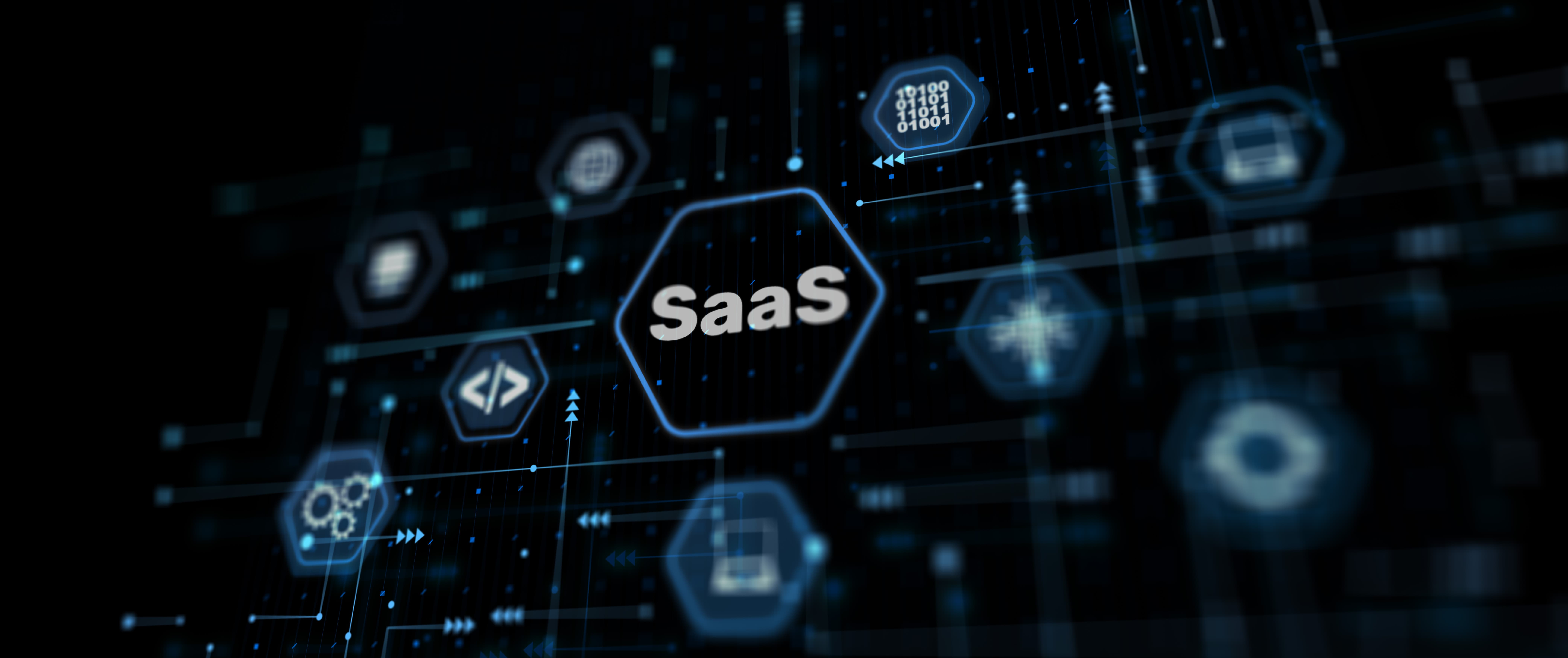 Keyboard signs and other imagery showcasing digital infrastructure in light blue tiles on a dark blue background, centred on one sayingSaaS